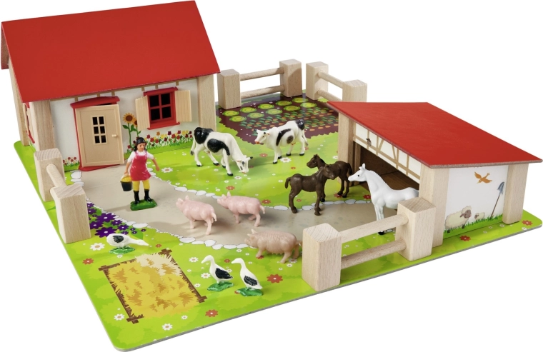 Stabilní dřevěné budovy s červenou střechou