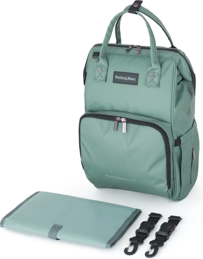 Volné ruce díky uchycení na kočárek a popruhu na kufr