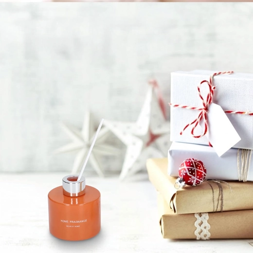 Elegantní difuzér v oranžovém skle