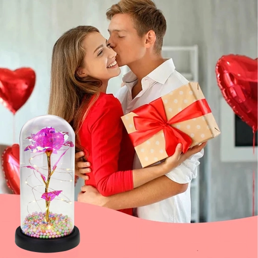 Zářivá růže pod sklem