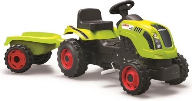 Šlapací traktor CLAAS se zeleným vozíkem