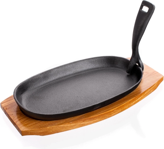Litinová oválná pánev 23 × 14 cm s dřevěným prkénkem GRADA