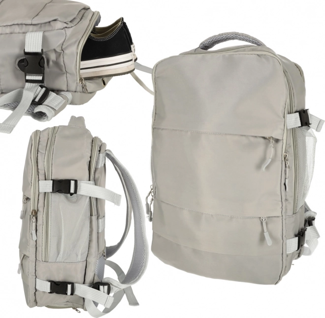 Šedý cestovní batoh s USB přípojkou voděodolný