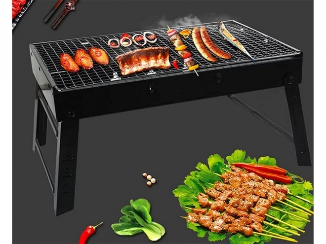 Přenosný skládací gril na dřevěné uhlí na kempování a BBQ